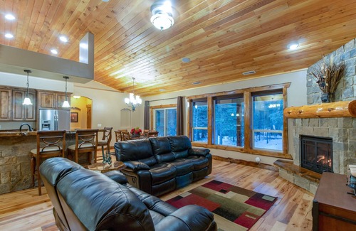 Tamarack Resort Cabin | REMOTE CABIN WITH HOT TUB, MOVIE THEATER AND HUGE COVERED DECK WITH FIRE TABLE