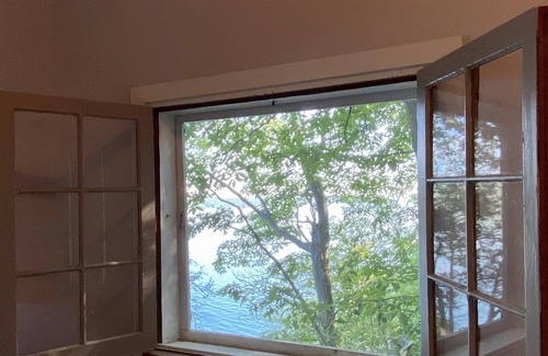 Rushville House | Renovated 1 BR Romantic lakefront cottage with incredible sunsets and views