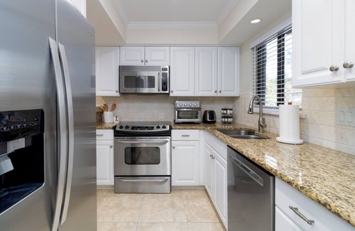 Hilton Head Island Condo | RENOVATED 3BD/3BA CONDO WITH ROOFTOP DECK & POOL STEPS TO BEACH & COLIGNY SHOPS