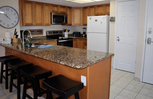 Madeira Beach Condo | Renovated and beachy Sandy Shores Condo- Across from Famous John's Pass!