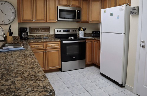 Madeira Beach Condo | Renovated and beachy Sandy Shores Condo- Across from Famous John's Pass!