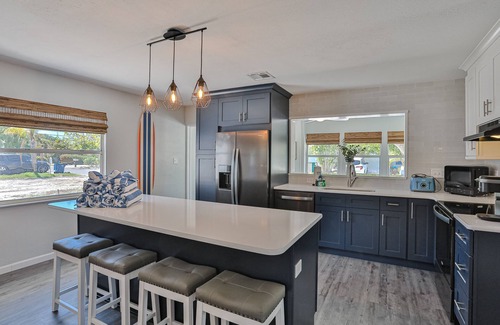 Holmes Beach House | Renovated home w/fenced yard, brand-new pool, spa, foosball - steps to beach