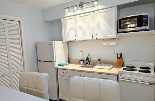 Northeast Virginia Beach Apartment | Renovated Oceanfront building, Boardwalk, Pool, Beach, Kitchen, studio for 3