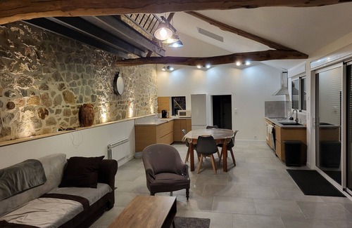 Nexon House | Renovated old house with large living room.