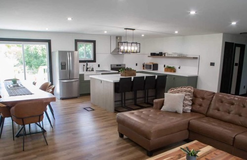 Bobcaygeon House | Renovated open concept family sized Home with game room and fire pit in backyard