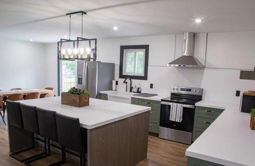 Bobcaygeon House | Renovated open concept family sized Home with game room and fire pit in backyard