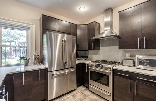 Merion Village House | Renovated Single Family Home w/2 Full Baths, EV Garage & walkable to restaurants