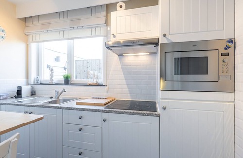 Middelkerke Apartment | Renovated studio with roof terrace near the sea.
