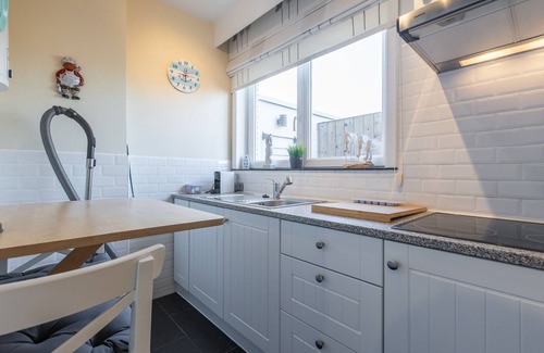 Middelkerke Apartment | Renovated studio with roof terrace near the sea.