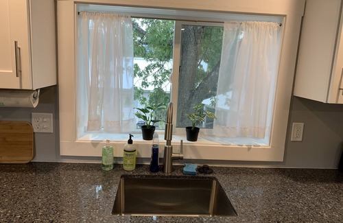 Kellogg House | Renovated Uptown Duplex w/Nice Views! Attached Garage Parking & Bike Storage.