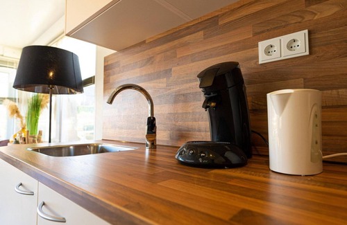 Lemmer House | Rent a Luxury Houseboat with roof terrace in and on the water in the popular Lemmer!