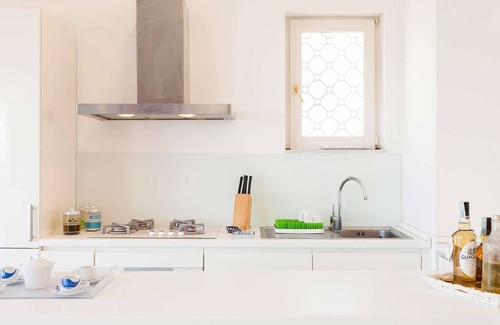 Priora House | Rentals in Italy - Casa Priore with equipped roof terrace and shared pool