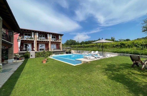 Montioni Apartment | Residence Tasso Canossa - appartamento con piscina