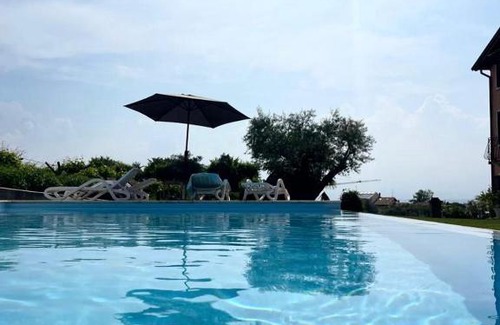 Montioni Apartment | Residence Tasso Canossa - appartamento con piscina