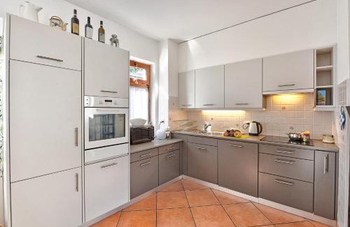 Melide Apartment | Residenza Lungolago Melide - Happy Rentals
