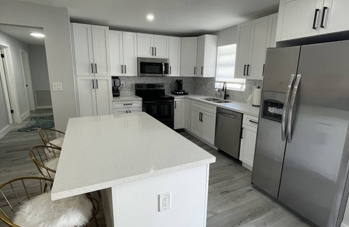 Garden Isles House | Resort 561-Saltwater heated pool & spa.