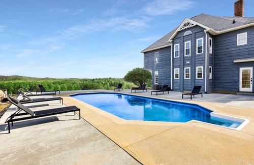 Logan House | Resort backyard | Pool | Game Room | Basketball