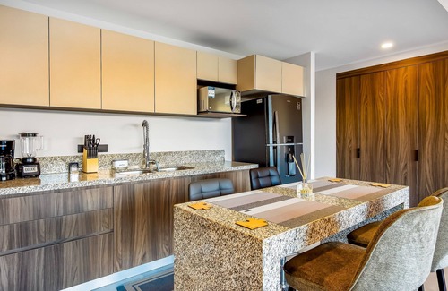 Puerto Vallarta Condo | Resort condo with balcony, scenic view, rooftop pool, & well-equipped kitchen