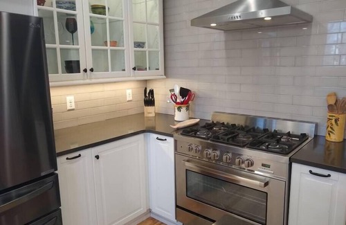 North Chattanooga House | resort like home with firepit and hot tub in trendy north shore