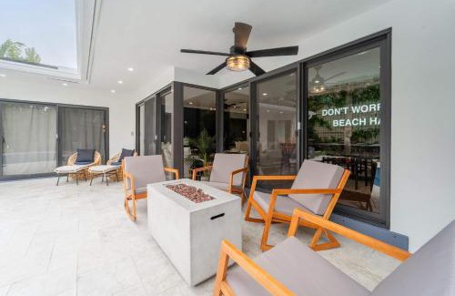 Imperial Point House | Resort Style Backyard Heated Pool Hot Tub Fire Pit