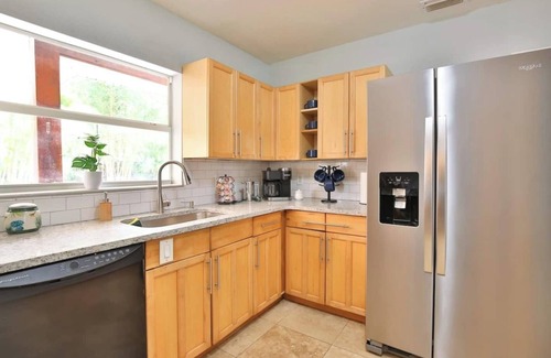 Trailer Estates Villa | Resort-Style Coastal Villa - Luxurious Courtyard - Splash Pad, Fire Pit, and More!