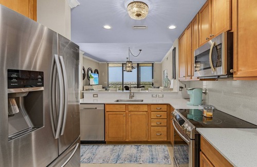 Cape Harbour Condo | Resort-style living high above the beautiful Cape Harbour Marina!