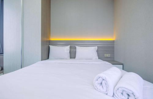Depok Apartment | Restful and Homey 2BR at Transpark Cibubur Apartment By Travelio