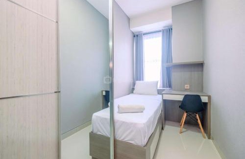 Depok Apartment | Restful and Homey 2BR at Transpark Cibubur Apartment By Travelio