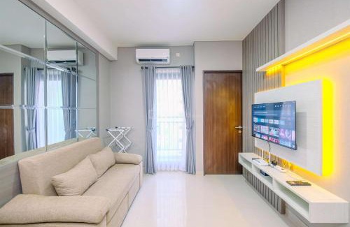 Depok Apartment | Restful and Homey 2BR at Transpark Cibubur Apartment By Travelio