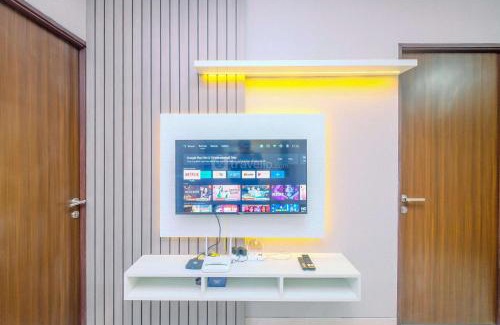 Depok Apartment | Restful and Homey 2BR at Transpark Cibubur Apartment By Travelio