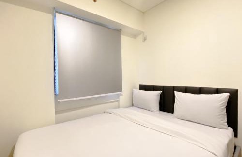 East Jakarta Apartment | Restful and Modern Look 2BR at Meikarta Apartment By Travelio