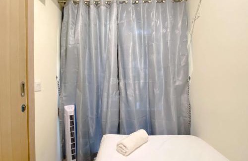 East Jakarta Apartment | Restful and Modern Look 2BR at Meikarta Apartment By Travelio