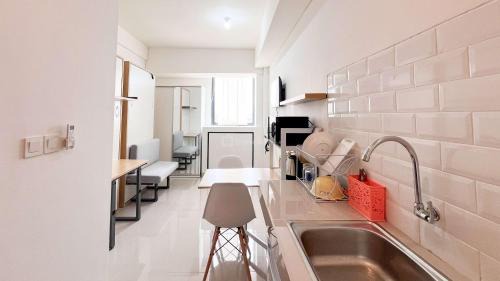 Makassar Apartment | Restful Studio (No Kitchen) Apartment at Bandaraya - Tallasa City Makassar By Travelio