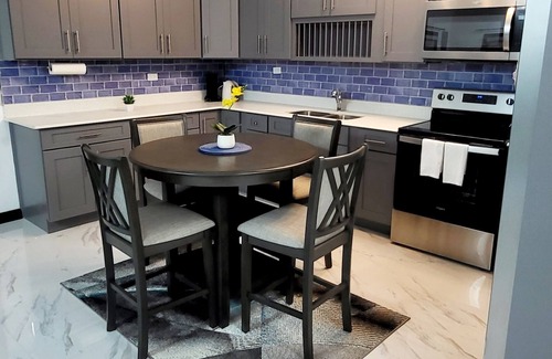 New Kingston Condo | Retreat in New Kingston - Prime location for families or business travelers.