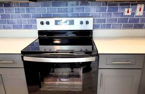 New Kingston Condo | Retreat in New Kingston - Prime location for families or business travelers.