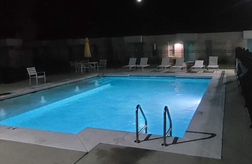 Gulf Shores Condo | Retro Retreat: Near beach, beautiful pool, walk to park and coffee shop.