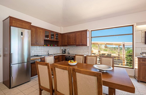 Kato Stalos Villa | Reverie villa, a spacious villa with private pool and breathtaking sea view
