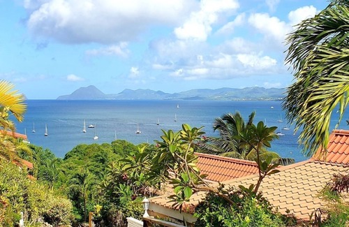 Sainte-Anne Condo | Rêves de Soleil: Summer Sunset Lodge with exceptional view of the bay