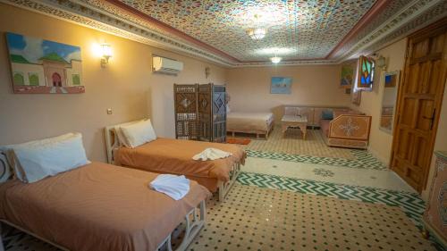 Al Machouar – Stinia House | Riad Golden Mansour