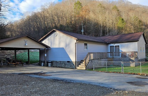 Covel House | Ride to the trails! Comfortable 5 bedroom house, large parking area!
