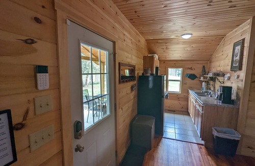 Laurelville Cabin | Ridgetop cabin featuring spa, sun room, fireplace and deck with panoramic views.