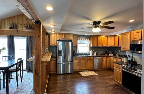 Laurium House | Right off the main trail system! Heated garage large parking for large trailers
