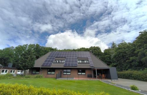 Jorl House | Rimmelsberg - moderne Ferienwohnungen mit Blick auf den hauseigenen See