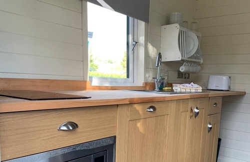 Llanfair Caereinion Cottage | River View 4 is a two berth unit in the style of a beautiful Gypsy hut.