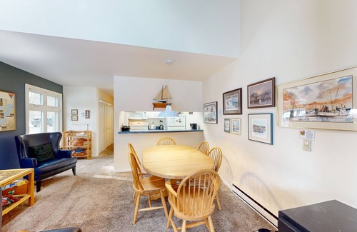 Glen Arbor Condo | River-view condo with fireplace, deck, washer/dryer, and community firepit
