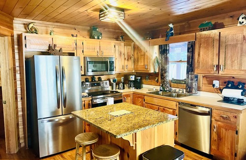 Epworth Cabin | Riverbend Cabin Waterfront dining & Trout Fishing with available guest cabin