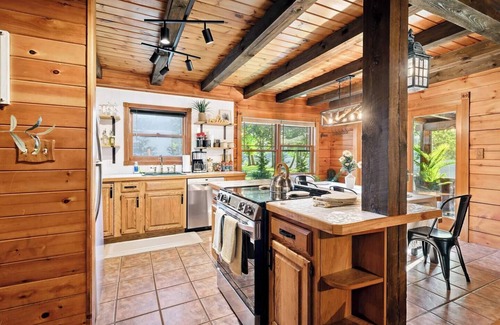 Waterford Cabin | Riverfront Cabin with Heated Pool, Cedar Hot Tub, Sauna and Dock