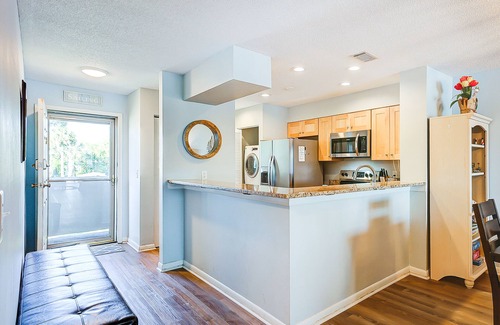 Folly Beach Condo | Riverfront condo with pool, 2 tennis courts, & screened porch - near beach