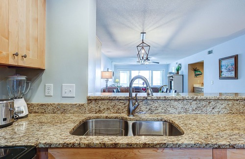 Folly Beach Condo | Riverfront condo with pool, 2 tennis courts, & screened porch - near beach