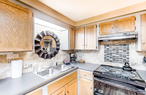 Joseph House | Riverfront ground-floor apartment with patio & lovely yard - dog-friendly